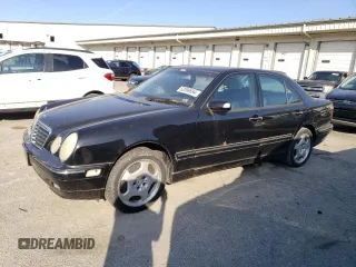 2002 Mercedes-Benz E-Class AWD with VIN WDBJF83J42X071300, listed as a Copart auction lot 52099694 with 147,155 mi miles and Clean Title. Bid and sale history available at carsss.com. Image 1.