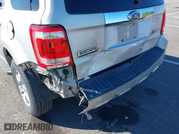 2009 Ford Escape Hybrid with VIN 1FMCU59349KA94375, listed as a IAAI auction lot 41865743 with 127,538 mi miles and . Bid and sale history available at DreamBid. Image 6.