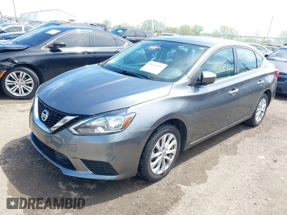 2019 Nissan Sentra S with VIN 3N1AB7AP3KY293231, listed as a IAAI auction lot 39213237 with 102,788 mi miles and . Bid and sale history available at DreamBid. Image 2.