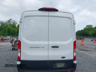 2022 Ford Transit Cargo with VIN 1FTBR1C85NKA74578, listed as a IAAI auction lot 42316744 with 63,376 mi miles and . Bid and sale history available at DreamBid. Image 16.
