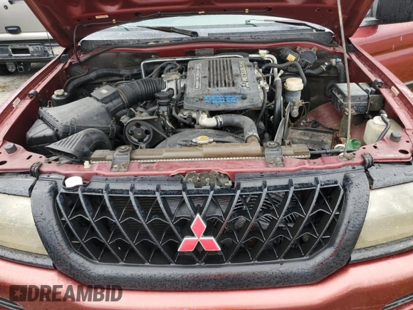 2001 Mitsubishi Montero ES z VIN JA4LS21H01P063609, wystawiony jako Copart lot #74446394 z przebiegiem 123 063 mil mil oraz Szkoda całkowita • Salvage title. Historia ofert i sprzedaży dostępna na DreamBid. Obrazek 11.