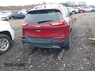 2015 Jeep Cherokee Limited with VIN 1C4PJLDB8FW732892, listed as a IAAI auction lot 41866593 with 153,477 mi miles and . Bid and sale history available at DreamBid. Image 16.
