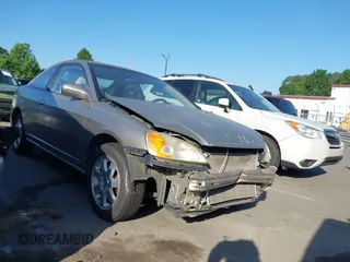 2003 Honda Civic EX with VIN 1HGEM22993L064351, listed as a IAAI auction lot 42182108 with 199,938 mi miles and . Bid and sale history available at carsss.com. Image 1.