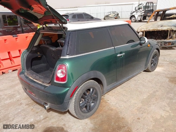 2013 MINI Cooper Hardtop with VIN WMWSU3C52DT690373, listed as a IAAI auction lot 41777229 with 125,190 mi miles. Bid and sale history available at carsss.com. Image 4.