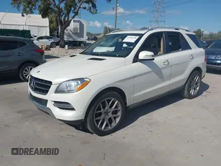 2014 Mercedes-Benz M 350 with VIN 4JGDA5HBXEA373643, listed as a IAAI auction lot 41554130 with 121,995 mi miles and . Bid and sale history available at DreamBid. Image 17.