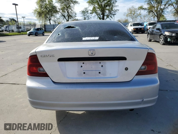 2002 Honda Civic DX with VIN 1HGEM22212L020068, listed as a Copart auction lot 50657135 with Not Provided miles and Salvage Title. Bid and sale history available at DreamBid. Image 6.