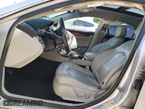 2011 Cadillac CTS Premium z VIN 1G6DS5ED2B0104323, wystawiony jako Copart lot #56596885 z przebiegiem Nie podano mil oraz Szkoda całkowita • Salvage title. Historia ofert i sprzedaży dostępna na DreamBid. Obrazek 7.