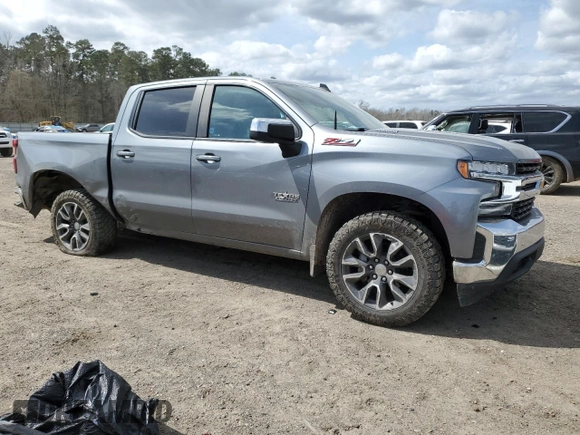 2021 Chevrolet Silverado 1500 LT with VIN 3GCUYDET4MG154765, listed as a Copart auction lot 48231225 with 99,353 mi miles and Salvage Title. Bid and sale history available at carsss.com. Image 4.