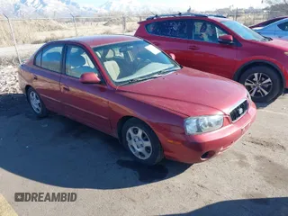 2003 Hyundai Elantra GLS z VIN KMHDN45D93U469313, wystawiony jako IAAI lot #41697422 z przebiegiem 178 571 mil mil oraz . Historia ofert i sprzedaży dostępna na DreamBid. Obrazek 1.