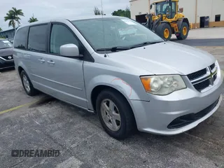 2012 Dodge Grand Caravan SXT with VIN 2C4RDGCG3CR308173, listed as a IAAI auction lot 42255879 with 96,489 mi miles and . Bid and sale history available at DreamBid. Image 1.