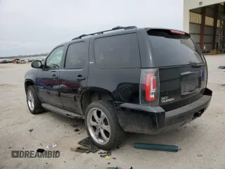 2009 GMC Yukon SLT 4SB with VIN 1GKFK33009R280856, listed as a Copart auction lot 51522635 with 265,941 mi miles and Salvage Title. Bid and sale history available at DreamBid. Image 2.