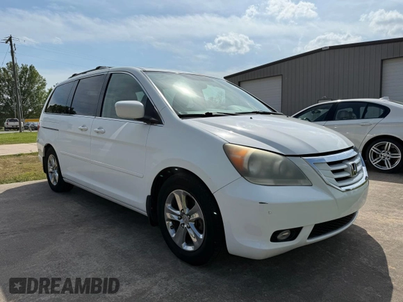 2010 Honda Odyssey Touring with VIN 5FNRL3H94AB047330, listed as a Copart auction lot 54064195 with 193,979 mi miles and Clean Title. Bid and sale history available at carsss.com. Image 1.