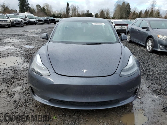 2023 Tesla Model 3 Long Range with VIN 5YJ3E1EB6PF686927, listed as a Copart auction lot 45602285 with 46,534 mi miles and Salvage Title. Bid and sale history available at DreamBid. Image 5.