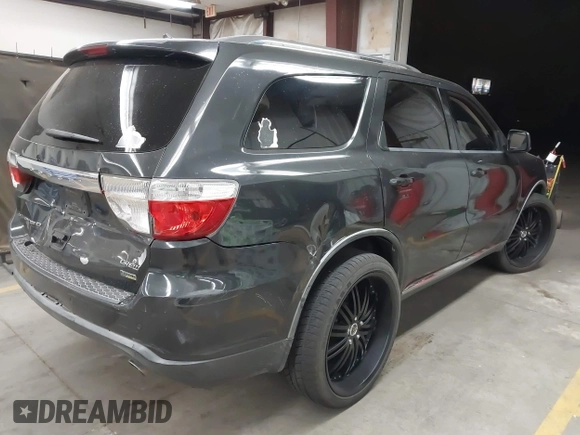 2011 Dodge Durango Crew with VIN 1D4RD4GG2BC729899, listed as a IAAI auction lot 41414720 with 209,281 mi miles and . Bid and sale history available at DreamBid. Image 4.