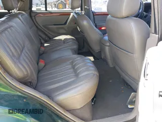 1999 Jeep Grand Cherokee Limited with VIN 1J4GW68N5XC666564, listed as a IAAI auction lot 42117018 with 177,440 mi miles. Bid and sale history available at carsss.com. Image 8.