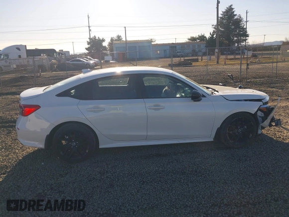 2024 Honda Civic Sport z VIN 2HGFE2F58RH550597, wystawiony jako IAAI lot #41688202 z przebiegiem 7 198 mil mil oraz . Historia ofert i sprzedaży dostępna na DreamBid. Obrazek 13.