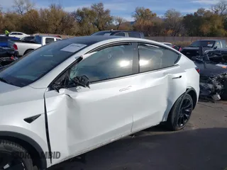 2021 Tesla Model Y Long Range with VIN 5YJYGDEE3MF098586, listed as a IAAI auction lot 40939802 with Not Provided miles and . Bid and sale history available at DreamBid. Image 6.