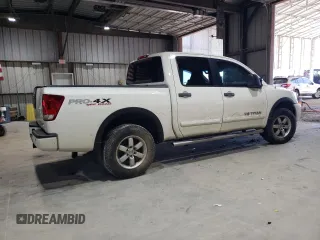 2010 Nissan Titan Pro-4X with VIN 1N6BA0EC3AN312601, listed as a Copart auction lot 52633455 with 161,260 mi miles and Salvage title. Bid and sale history available at DreamBid. Image 3.