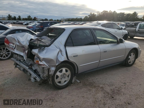 2002 Honda Accord LX z VIN JHMCG55432C034824, wystawiony jako Copart lot #83174914 z przebiegiem 193 883 mil mil oraz Szkoda całkowita • Salvage title. Historia ofert i sprzedaży dostępna na DreamBid. Obrazek 3.