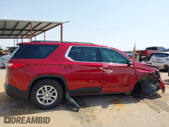 2021 Chevrolet Traverse LT with VIN 1GNERHKW9MJ117918, listed as a IAAI auction lot 42470808 with 77,535 mi miles and . Bid and sale history available at DreamBid. Image 13.