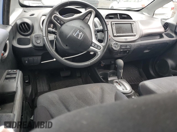 2009 Honda Fit Sport z VIN JHMGE88619S045049, wystawiony jako Copart lot #54223135 z przebiegiem 107 601 mil mil oraz Szkoda całkowita • Salvage title. Historia ofert i sprzedaży dostępna na DreamBid. Obrazek 8.
