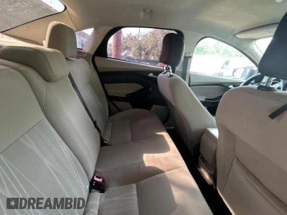 2015 Ford Focus SE with VIN 1FADP3F21FL338821, listed as a Copart auction lot 62089035 with 84,648 mi miles and Salvage title. Bid and sale history available at DreamBid. Image 6.
