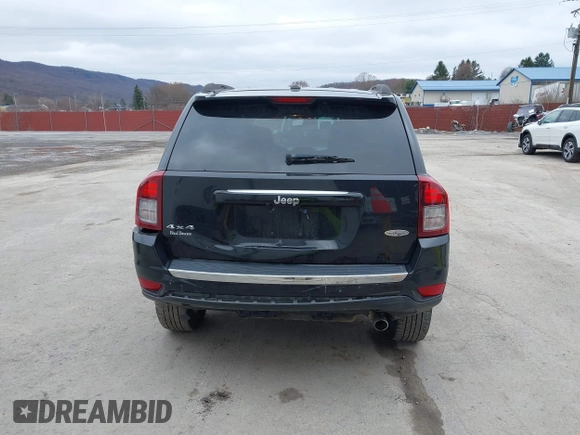2016 Jeep Compass Latitude with VIN 1C4NJDEB8GD695268, listed as a IAAI auction lot 41724921 with 137,118 mi miles. Bid and sale history available at carsss.com. Image 16.