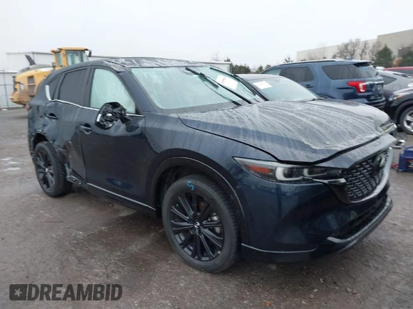 2022 Mazda CX-5 2.5 Turbo with VIN JM3KFBAY8N0635618, listed as a IAAI auction lot 41199038 with Not Provided miles and . Bid and sale history available at carsss.com. Image 1.