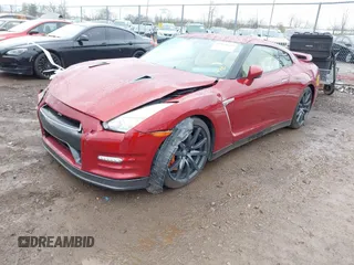 2015 Nissan GT-R Premium z VIN JN1AR5EFXFM280227, wystawiony jako IAAI lot #41920650 z przebiegiem 79 140 mil mil oraz . Historia ofert i sprzedaży dostępna na DreamBid. Obrazek 2.