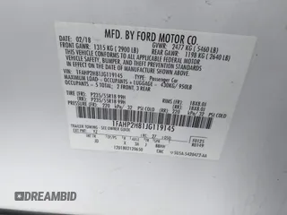 2018 Ford Taurus SEL z VIN 1FAHP2H81JG119145, wystawiony jako IAAI lot #41997302 z przebiegiem 61 467 mil mil oraz . Historia ofert i sprzedaży dostępna na DreamBid. Obrazek 9.