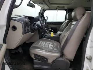 2005 Hummer H2 SUT with VIN 5GRGN22U15H123731, listed as a Copart auction lot 87680395 with 205,043 mi miles and Salvage Title. Bid and sale history available at carsss.com. Image 7.
