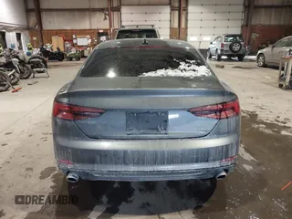 2018 Audi A5 Premium Plus with VIN WAUTNAF50JA011354, listed as a IAAI auction lot 41396659 with 74,936 mi miles and . Bid and sale history available at DreamBid. Image 16.
