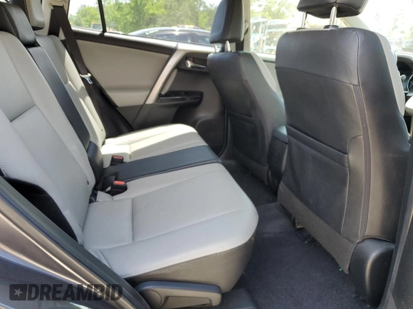 2016 Toyota RAV4 Limited z VIN JTMDFREVXGJ076533, wystawiony jako Copart lot #57480995 z przebiegiem 124 626 mil mil oraz Szkoda całkowita • Salvage title. Historia ofert i sprzedaży dostępna na DreamBid. Obrazek 12.
