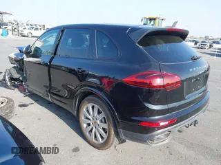 2017 Porsche Cayenne with VIN WP1AA2A29HKA86226, listed as a IAAI auction lot 40999976 with 55,883 mi miles. Bid and sale history available at carsss.com. Image 3.