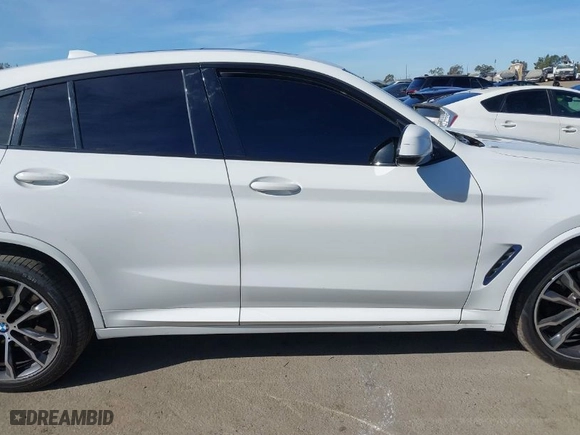 2021 BMW X4 xDrive30i with VIN 5UX2V1C0XM9E90574, listed as a IAAI auction lot 41422478 with NaN miles. Bid and sale history available at carsss.com. Image 13.