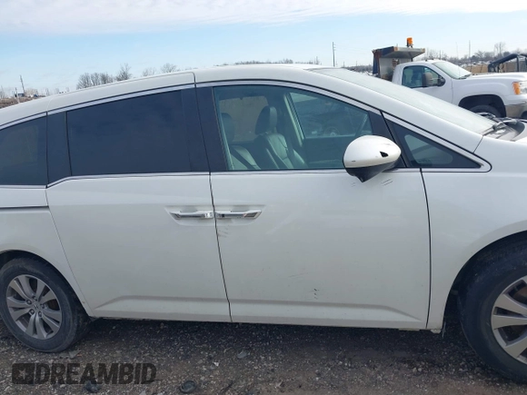 2017 Honda Odyssey EX-L with VIN 5FNRL5H62HB014449, listed as a IAAI auction lot 41736940 with 205,144 mi miles and . Bid and sale history available at DreamBid. Image 13.