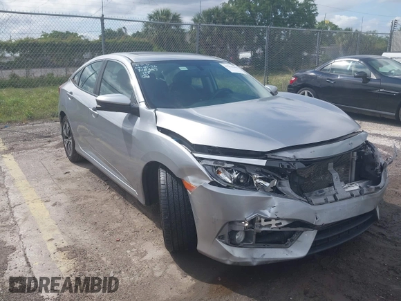 2017 Honda Civic Sedan EX-L with VIN 2HGFC1F73HH654625, listed as a IAAI auction lot 41962609 with 77,991 mi miles. Bid and sale history available at carsss.com. Image 1.