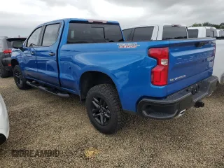 2023 Chevrolet Silverado 1500 LT Trail Boss with VIN 3GCUDFE89PG291160, listed as a Copart auction lot 74374664 with 5,757 mi miles and Salvage Title. Bid and sale history available at DreamBid. Image 2.