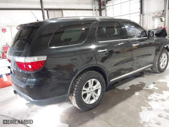 2013 Dodge Durango Crew with VIN 1C4SDJDT9DC670738, listed as a IAAI auction lot 41329419 with 149,520 mi miles. Bid and sale history available at carsss.com. Image 4.