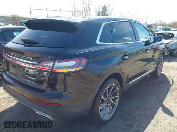 2020 Lincoln Nautilus Reserve with VIN 2LMPJ8K90LBL10657, listed as a IAAI auction lot 42091471 with 74,927 mi miles and . Bid and sale history available at DreamBid. Image 4.