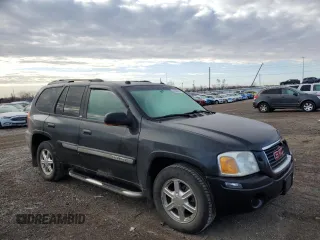2005 GMC Envoy SLT with VIN 1GKDT13S552310799, listed as a Copart auction lot 43586125 with 182,928 mi miles and Salvage Title. Bid and sale history available at carsss.com. Image 4.