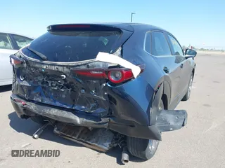 2021 Mazda CX-30 Preferred with VIN 3MVDMBCLXMM202269, listed as a IAAI auction lot 42234251 with 41,702 mi miles and . Bid and sale history available at DreamBid. Image 6.