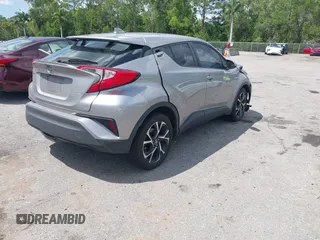 2019 Toyota C-HR XLE with VIN NMTKHMBX8KR093044, listed as a IAAI auction lot 41939036 with 60,130 mi miles. Bid and sale history available at carsss.com. Image 4.
