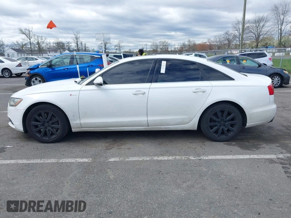 2013 Audi A6 Premium Plus with VIN WAUGGAFCXDN124879, listed as a IAAI auction lot 42041791 with 162,388 mi miles and . Bid and sale history available at DreamBid. Image 14.