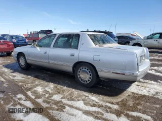 1999 Cadillac DeVille z VIN 1G6KD54Y5XU774986, wystawiony jako Copart lot #50167955 z przebiegiem 151 375 mil mil oraz Czysty tytuł • Clean title. Historia ofert i sprzedaży dostępna na DreamBid. Obrazek 2.