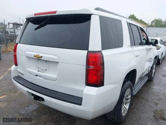 2017 Chevrolet Tahoe LT with VIN 1GNSCBKC1HR200807, listed as a IAAI auction lot 41917005 with 129,910 mi miles. Bid and sale history available at carsss.com. Image 4.