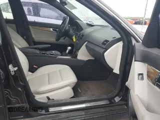 2009 Mercedes-Benz C-Class 3.5L Sport with VIN WDDGF56X19R043159, listed as a IAAI auction lot 41910010 with 173,817 mi miles. Bid and sale history available at carsss.com. Image 5.