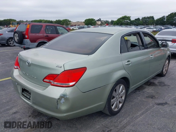 2005 Toyota Avalon XL with VIN 4T1BK36B65U005616, listed as a IAAI auction lot 41404396 with 99,397 mi miles and . Bid and sale history available at DreamBid. Image 6.