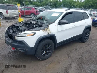 2016 Jeep Cherokee Trailhawk with VIN 1C4PJMBS6GW210756, listed as a IAAI auction lot 42423757 with Not provided miles and . Bid and sale history available at DreamBid. Image 2.