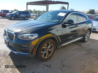 2020 BMW X4 xDrive30i z VIN 5UX2V1C05L9C41372, wystawiony jako IAAI lot #42316997 z przebiegiem 73 412 mil mil oraz . Historia ofert i sprzedaży dostępna na DreamBid. Obrazek 2.